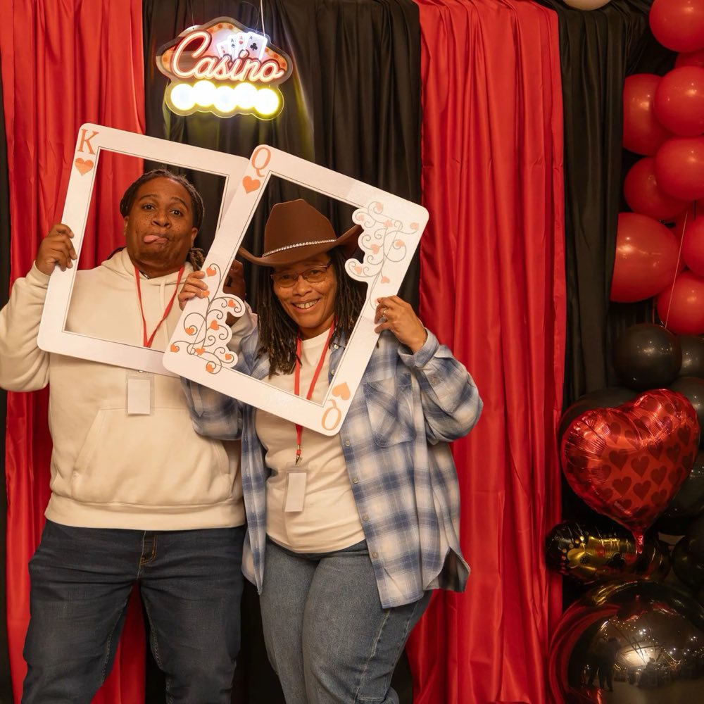 Guests with props at a photo booth