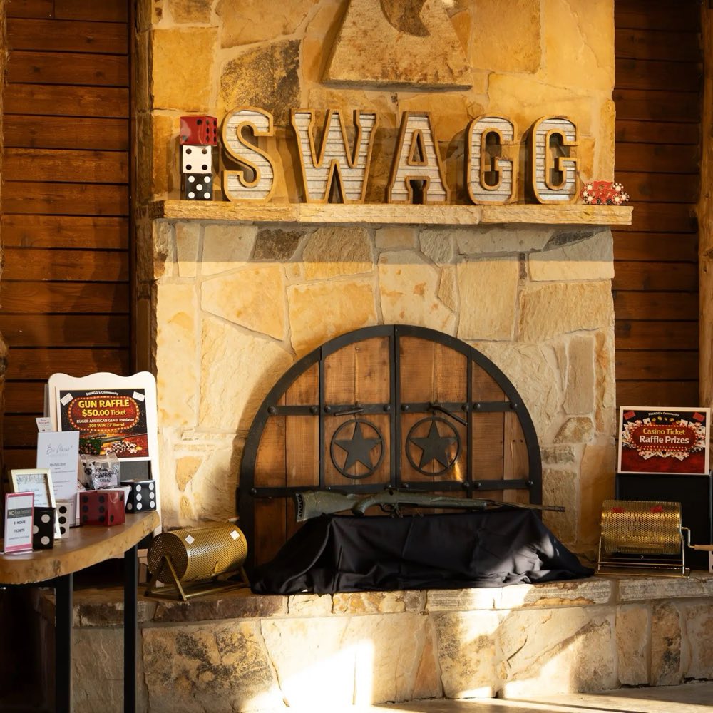 Casino Night fundraiser entrance with SWAGG sign